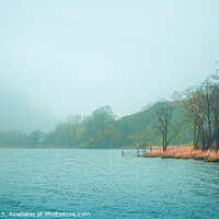 Buy canvas prints of A ghostly mist envelopes a Lake in Snowdonia by Mike Shields