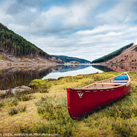 Buy canvas prints of Lakeside Canoe  by Mike Shields