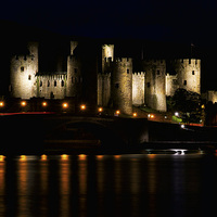 Buy canvas prints of Enchanting Conwy Castle: An Evening Spectacle by Mike Shields