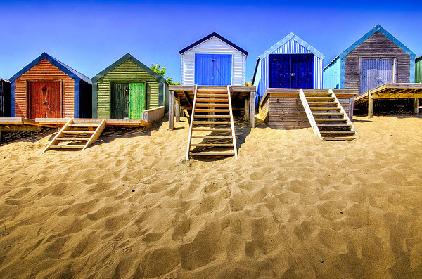 Vibrant Haven: Abersoch Beach Huts Picture Board by Mike Shields