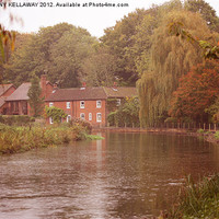 Buy canvas prints of river itchen cottages by Anthony Kellaway