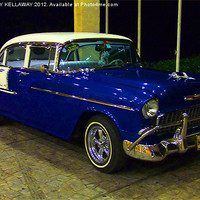 Buy canvas prints of BLUE CADILLAC IN CUBA by Anthony Kellaway