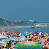 Buy canvas prints of BOURNEMOUTH BEACH IN SUMMER by Anthony Kellaway