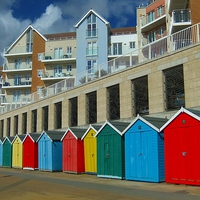 Buy canvas prints of BEACH HUTS BOSCOMBE by Anthony Kellaway