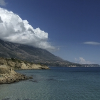 Buy canvas prints of  LOW CLOUD OVER MOUNT AINOS KEFALONIA by Anthony Kellaway