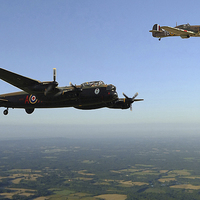 Buy canvas prints of AVRO LANCASTER AND HAWKER HURRICANE by Anthony Kellaway