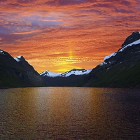 Buy canvas prints of  NORWEGIAN FJORD SUNSET by Anthony Kellaway