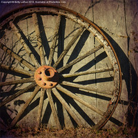 Buy canvas prints of Old West Wagon Wheel by Betty LaRue