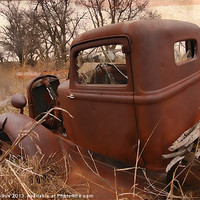 Buy canvas prints of Where Old Trucks Go To Die by Betty LaRue