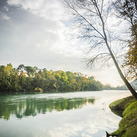 Buy canvas prints of  The autumn on the river by Chiara Cattaruzzi