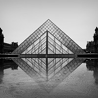 Buy canvas prints of Louvre in the rain. by Nick Wardekker