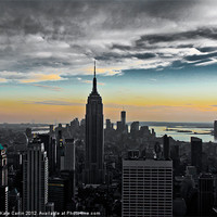 Buy canvas prints of Empire State, Stormy Sunset. by Kitty 