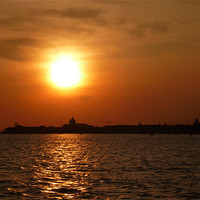 Buy canvas prints of Sun going down over Venice. by Kitty 