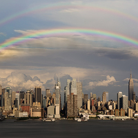 Buy canvas prints of Double Rainbow Over NYC by Susan Candelario