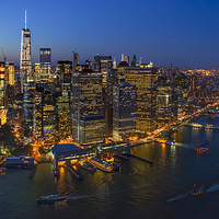 Buy canvas prints of Illuminated Lower Manhattan NYC by Susan Candelario