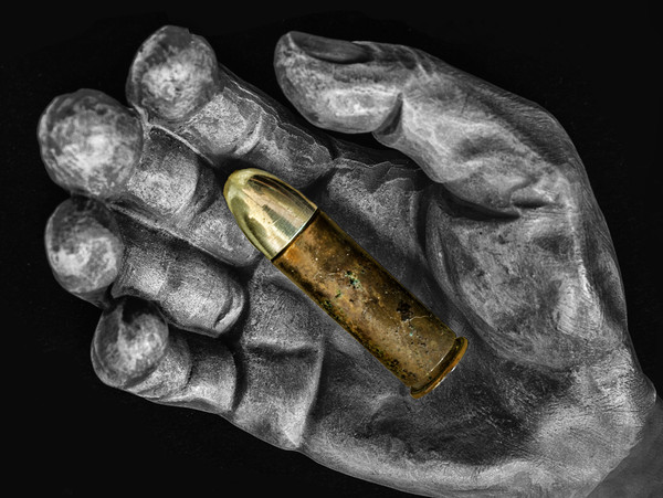 Bullet in hand Picture Board by Jonathan Thirkell