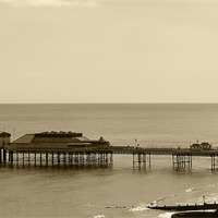 Buy canvas prints of Cromer Pier by Rebecca Giles