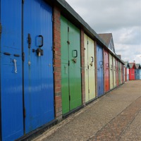 Buy canvas prints of Beach Huts by Rebecca Giles