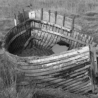 Buy canvas prints of Old Boat at Blakeney, North Norfolk by Rebecca Giles