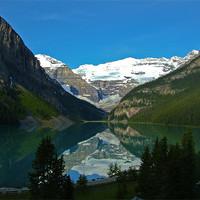 Buy canvas prints of Crisp reflection at Lake Louise by Phil Emmerson