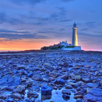 Buy canvas prints of St Marys Lighthouse at Sunset by Phil Emmerson