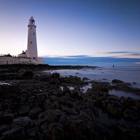 Buy canvas prints of St Marys Lighthouse & Rocks by Phil Emmerson