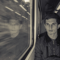 Buy canvas prints of Man on a train by Jonny Essex
