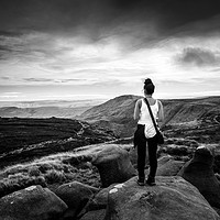 Buy canvas prints of A women stands on top of a mountain, Kinder Scout by Jonny Essex