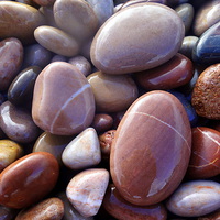 Buy canvas prints of  Glossy,wet, pebbles by Paula Palmer canvas