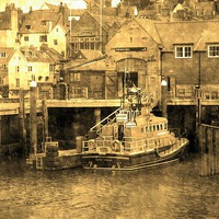 Buy canvas prints of  Whitby Lifeboat waiting in the harbour by Paula Palmer canvas