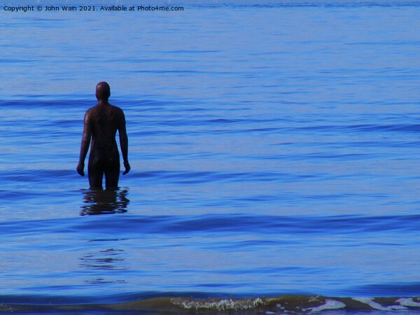 Gormley Iron Man as the tide returns Picture Board by John Wain