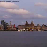Buy canvas prints of Liverpool Waterfront Skyline at night by John Wain