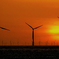 Buy canvas prints of Windmills at Sunset (Digital Art) by John Wain