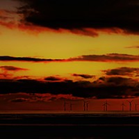 Buy canvas prints of Windmills at Sunset by John Wain