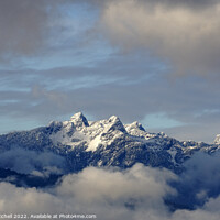Buy canvas prints of The Lions Peaks in Winter by John Mitchell