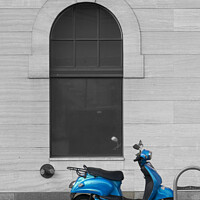 Buy canvas prints of Selective colour blue motor scooter by John Mitchell