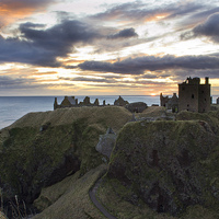 Buy canvas prints of Dunnottar Castle nr Stonehaven at Sunrise by Michael Moverley