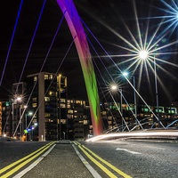 Buy canvas prints of  Light trails over Glasgow's Squinty Bridge by Michael Moverley