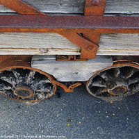 Buy canvas prints of Antique Train Trailer Wheels by Patti Barrett