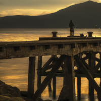 Buy canvas prints of Angler on Pier at Portencross by Tylie Duff Photo Art