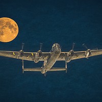 Buy canvas prints of Lancaster Bomber Moon by Tylie Duff Photo Art