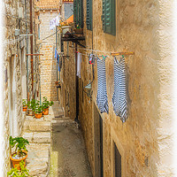 Buy canvas prints of Wash Day in Dubrovnik Old Town by Tylie Duff Photo Art