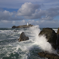 Buy canvas prints of Godrevy Rocks and Lighthouse, St Ives Bay by Brian Pierce