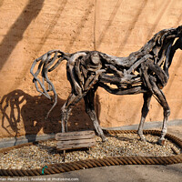 Buy canvas prints of Wooden Horse Sculpture by Brian Pierce