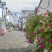 Buy canvas prints of Enchanting Clovelly Village by Graham Custance