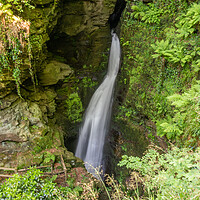 Buy canvas prints of St Nectan's Glen Waterfall by Graham Custance