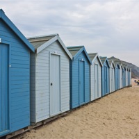 Buy canvas prints of Beach Huts at Charmouth by Graham Custance