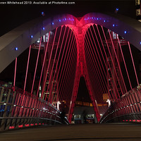 Buy canvas prints of Downlit Bridge in Red by Darren Whitehead