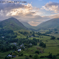 Buy canvas prints of Helm Crag and Dunmail Raise sunset by Graham Moore