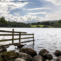Buy canvas prints of Old fence at Loughrigg Tarn by Graham Moore